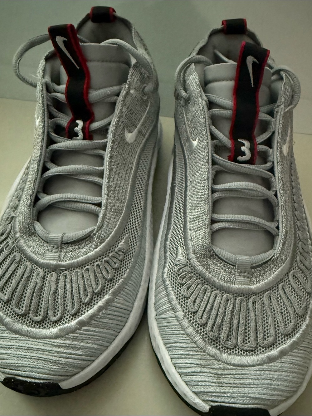 Nike Silver and Black Running Shoes with Red Trim